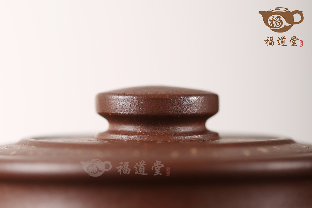腰圓古卣華亭