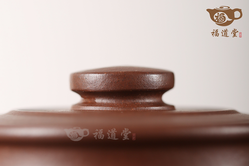 腰圓古卣華亭