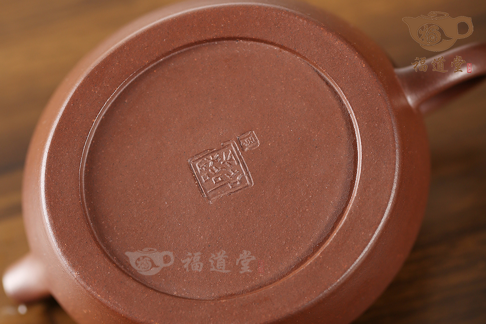 腰圓古卣華亭