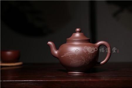 由徐勇良大师装饰，一把刻绘盖过制壶老师风采的紫砂作品