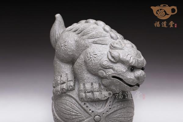 对狮