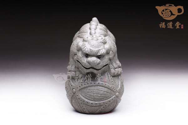 对狮