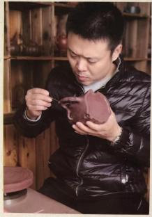 奚亮